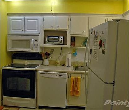 5th image of 2850 N Palm Aire Dr APT 203