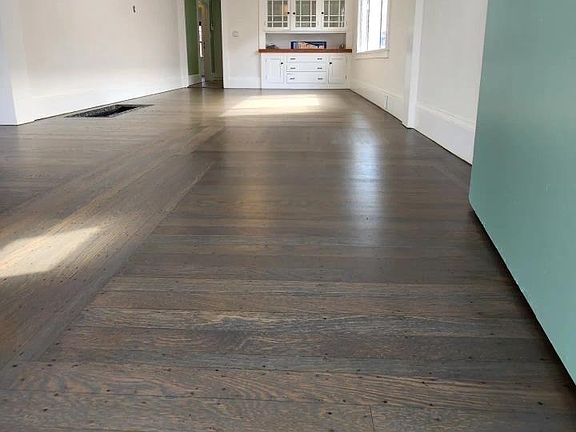 Entrance - refinished wood floors & fresh interior paint