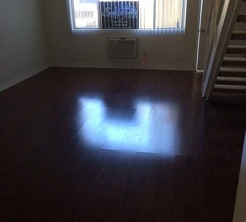 Newly painted Living Room with Laminated Wood Flooring