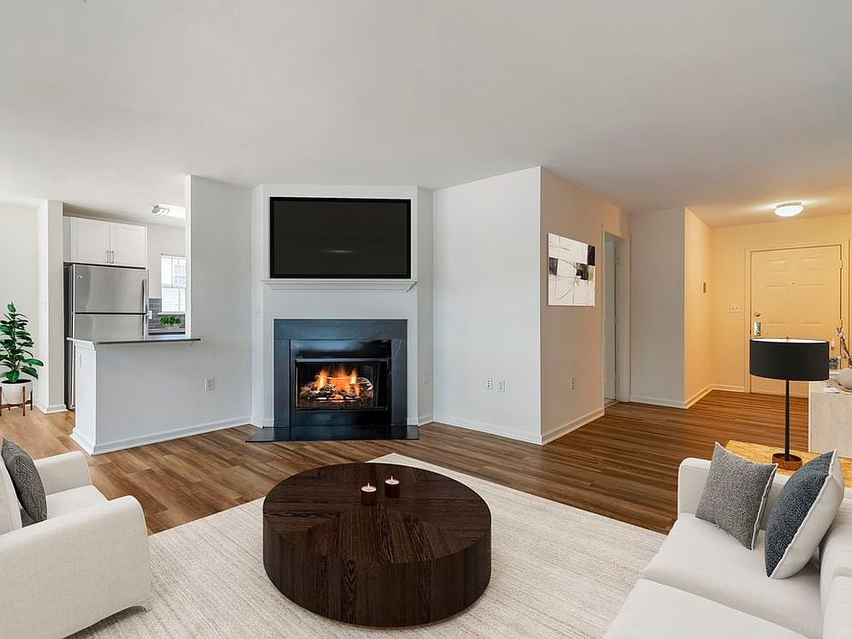 Renovated Package II living area with hard surface plank flooring