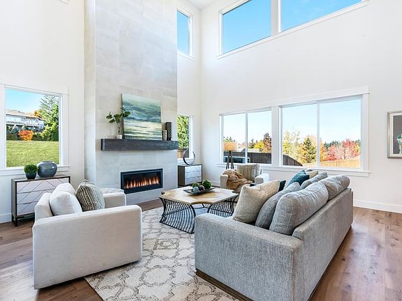 Representative Photo - Floor-to-ceiling fireplace feature wall in the great room