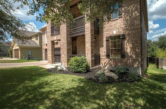 Drought Resistant Cactus and Texas Limestone in Front Flower Bed!