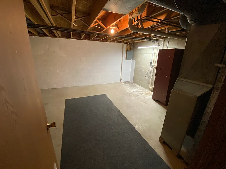 Unfinished basement. Location for washer and dryer
