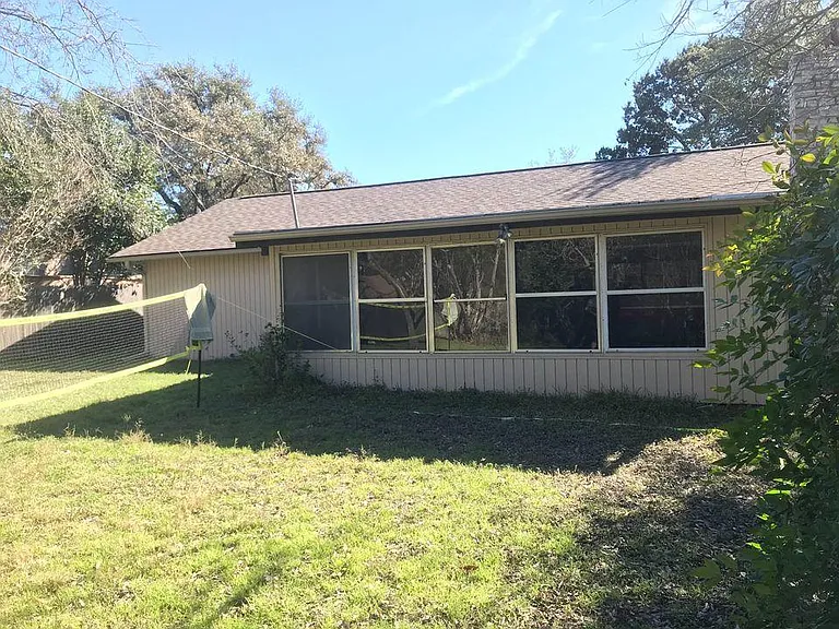fully-enclosed back patio