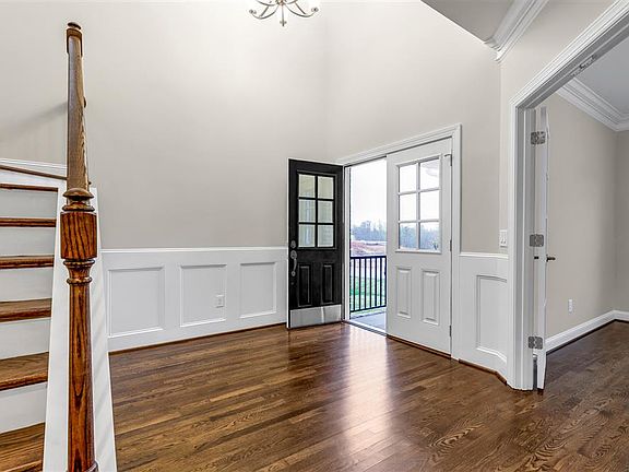 Grand two-story foyer at front door entrance