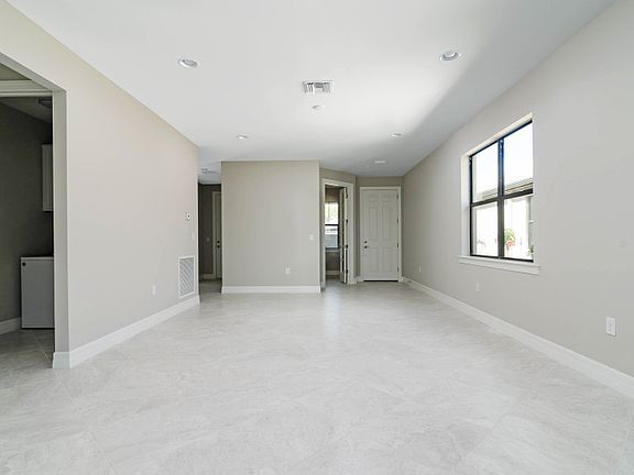 Model Representation Open floor plan with connecting tile floors