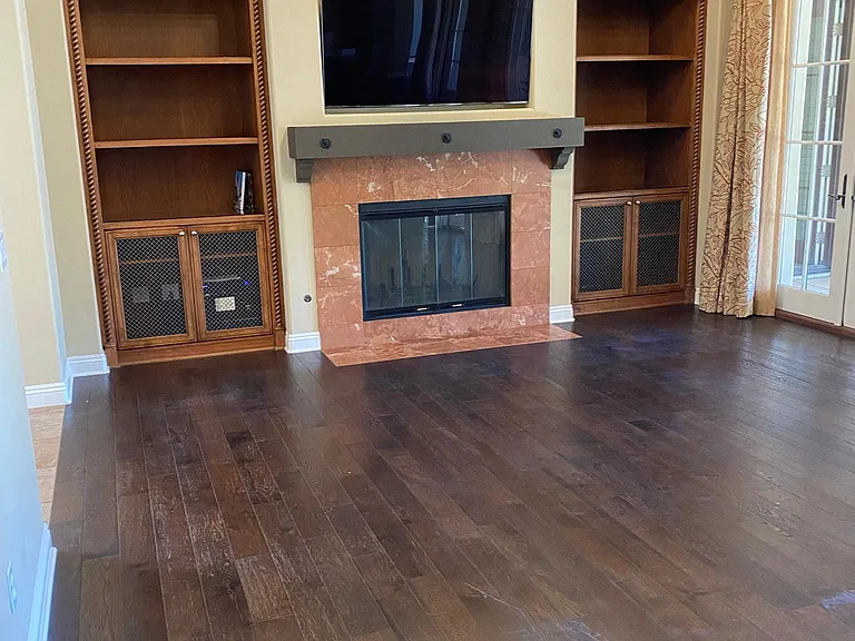 Living room with built in and surround sound.