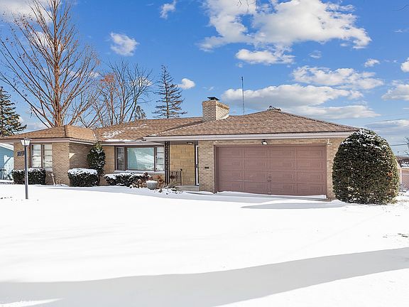 Brick front, 4 year old roof, 2.5 car garage with loads of storage and a 10' workbench!