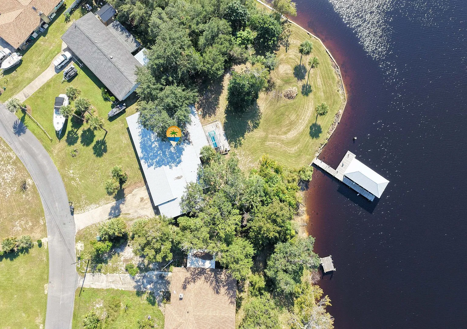 Waterfront Retreat with Private Dock, 12,000-Lb Boat Lift, Swim Spa & Luxury Primary Suite! — Photo 1