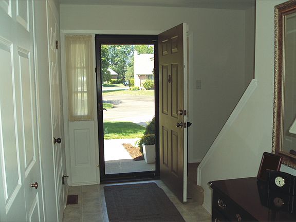 Foyer (half bath on left, stairs on right)