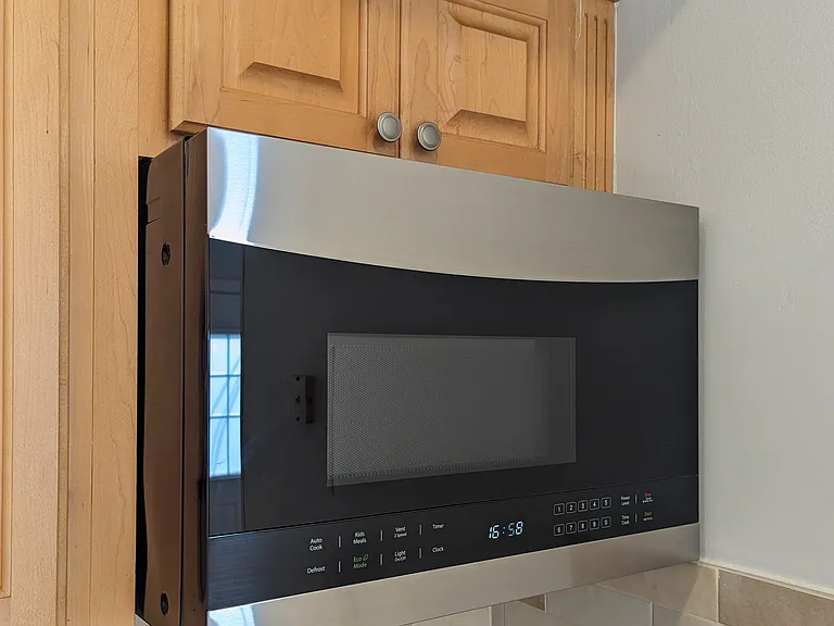 New microwave over cook top of the oven