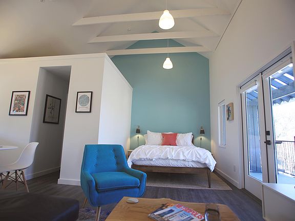 Sweet vaulted ceiling shows a storage loft above the closet and bathroom
