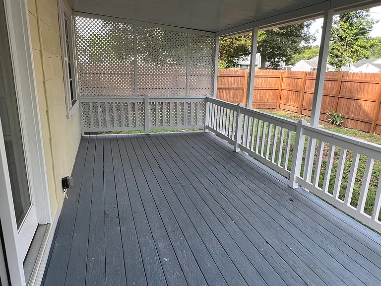 large covered side porch (west side)