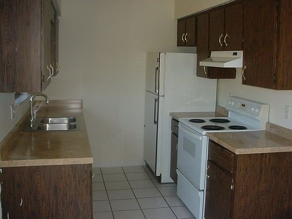 All tile floors except BR's