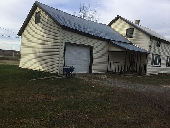 Attached garage, East side