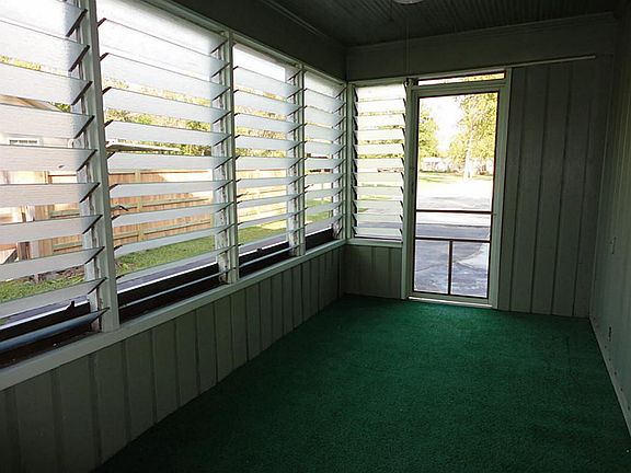  Sun porch - perfect place for morning coffee or afternoon tea - panoramic view of yard and property.