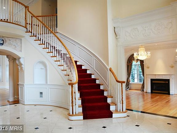 Grand 2-Story Foyer with Marble Flooring
