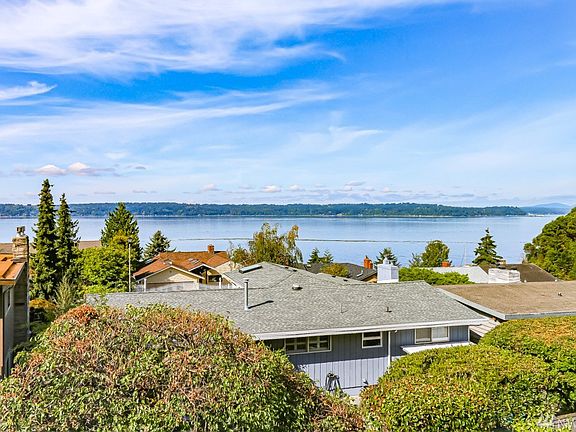 Enjoy beautiful views from the living room, dining room, kitchen, family room and upper level master suite!