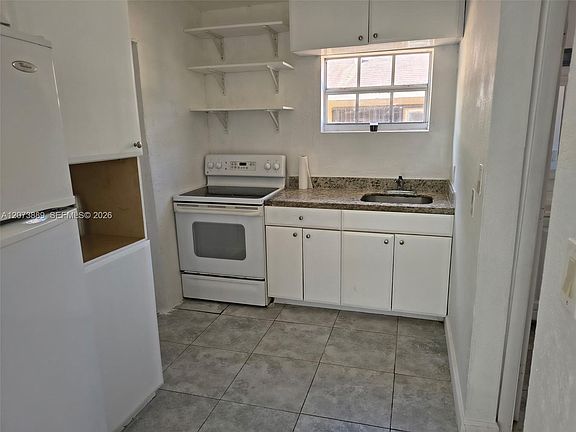 5th image of 230 NW 64th St