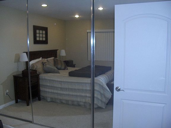 Wall to wall Mirrored Closets