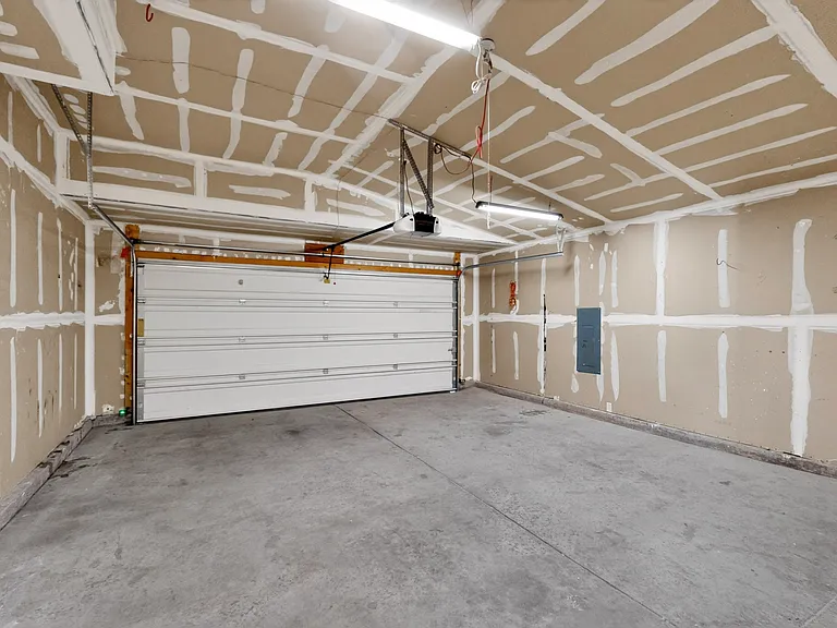 The large two car finished garage gives provides plenty of space for two vehicles and some storage as well.