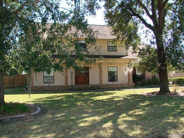Home sits on 3/4 acre with several live oaks