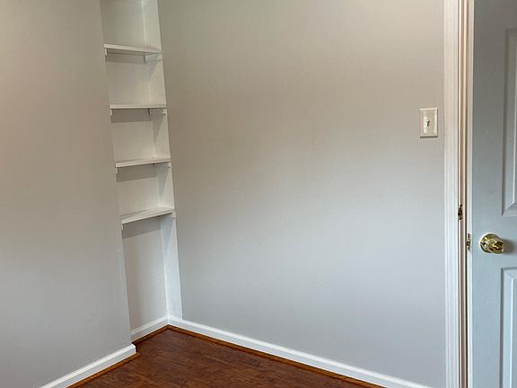 Second bedroom has a new laminate floors & mini shelving. This room also has a full closet.