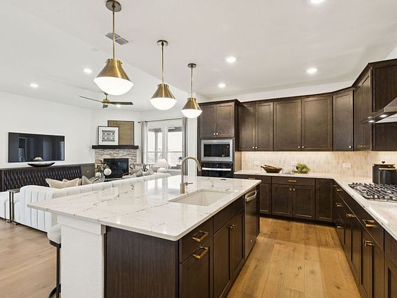 Abundant cabinet space in kitchen model representation