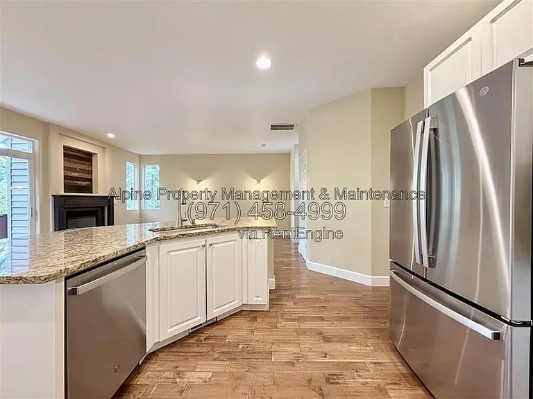 5758 NE Damsel Dr — Photo 11