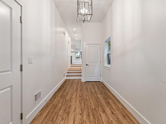Front Entry looking into Kitchen and Living Room