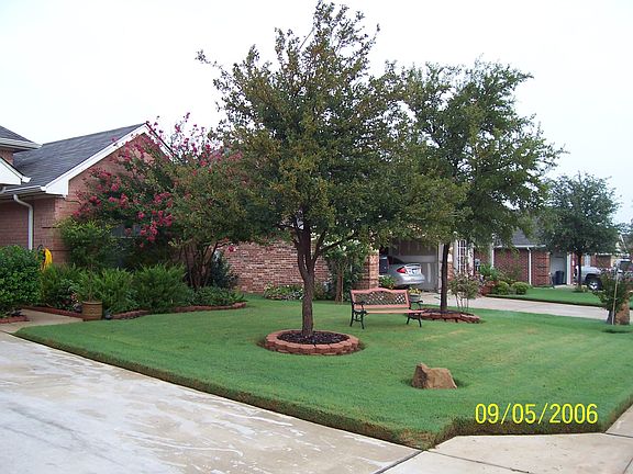 Manicured lawn in front yard