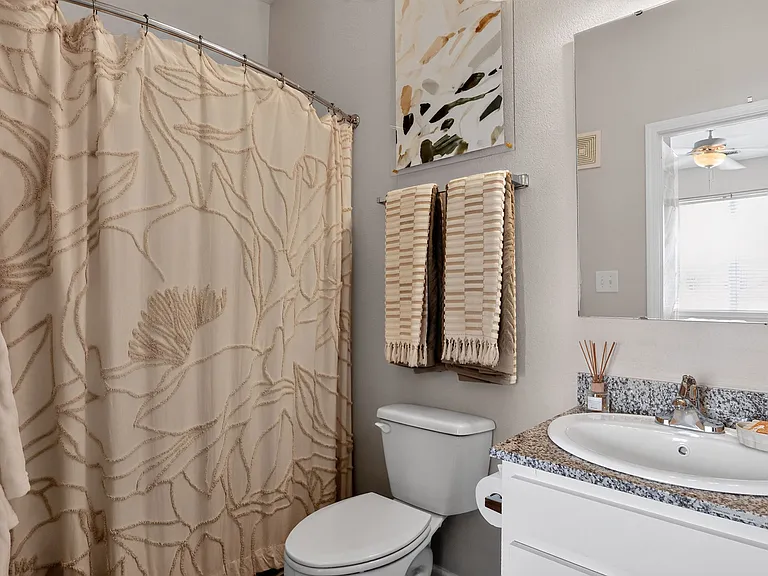 Relax in a Modern Bathroom with Granite Vanity at Ralston Apartments
