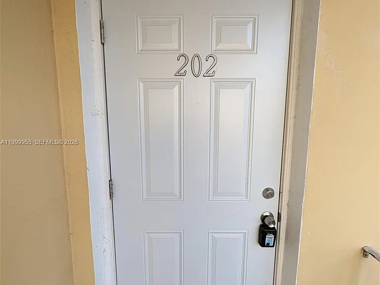7360 SW 82nd St #E202 — Photo 1