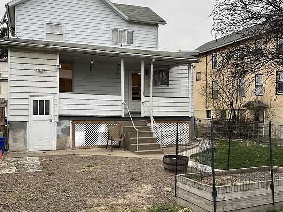 1023 Back with covered porch.