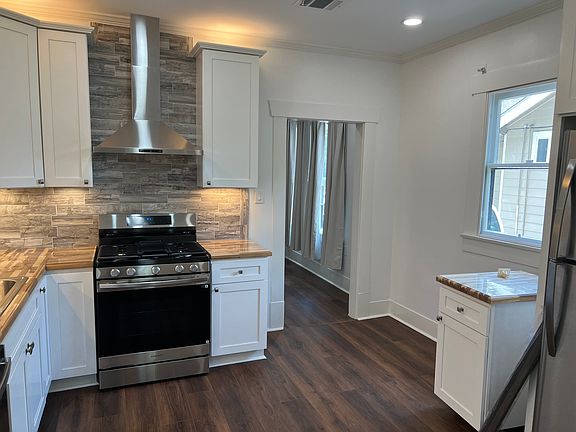 Kitchen / Rolling Island / New Stove / New Dishwasher / New Countertops / New Backsplash/ New Cabinets