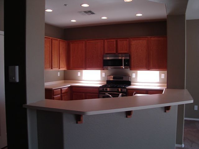 S/S Appliances and breakfast bar.