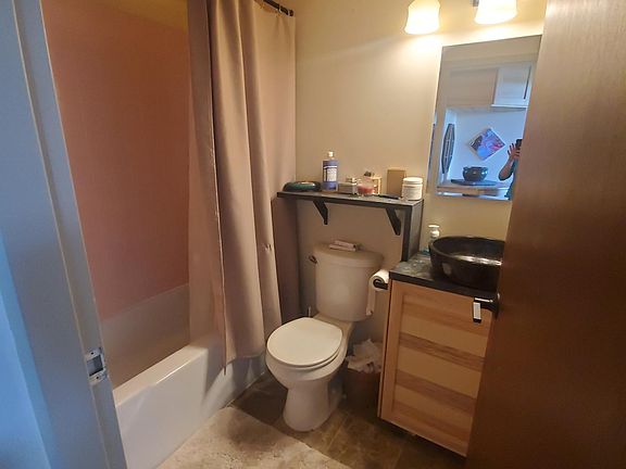 Comfort height toilet and upgraded counter design for space maximization.