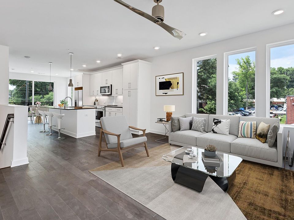 Living room looking towards kitchen and dining area
