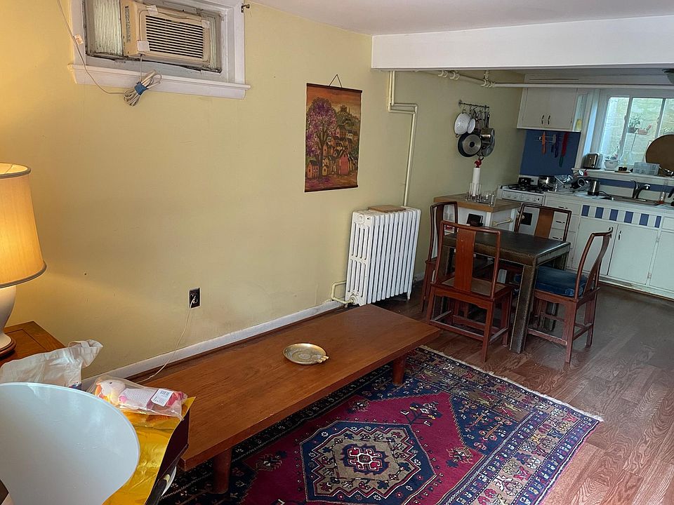 Living room and kitchen, and what you see when opening the private entrance