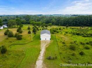 1404 W Cutler Rd, Six Lakes, MI 48886