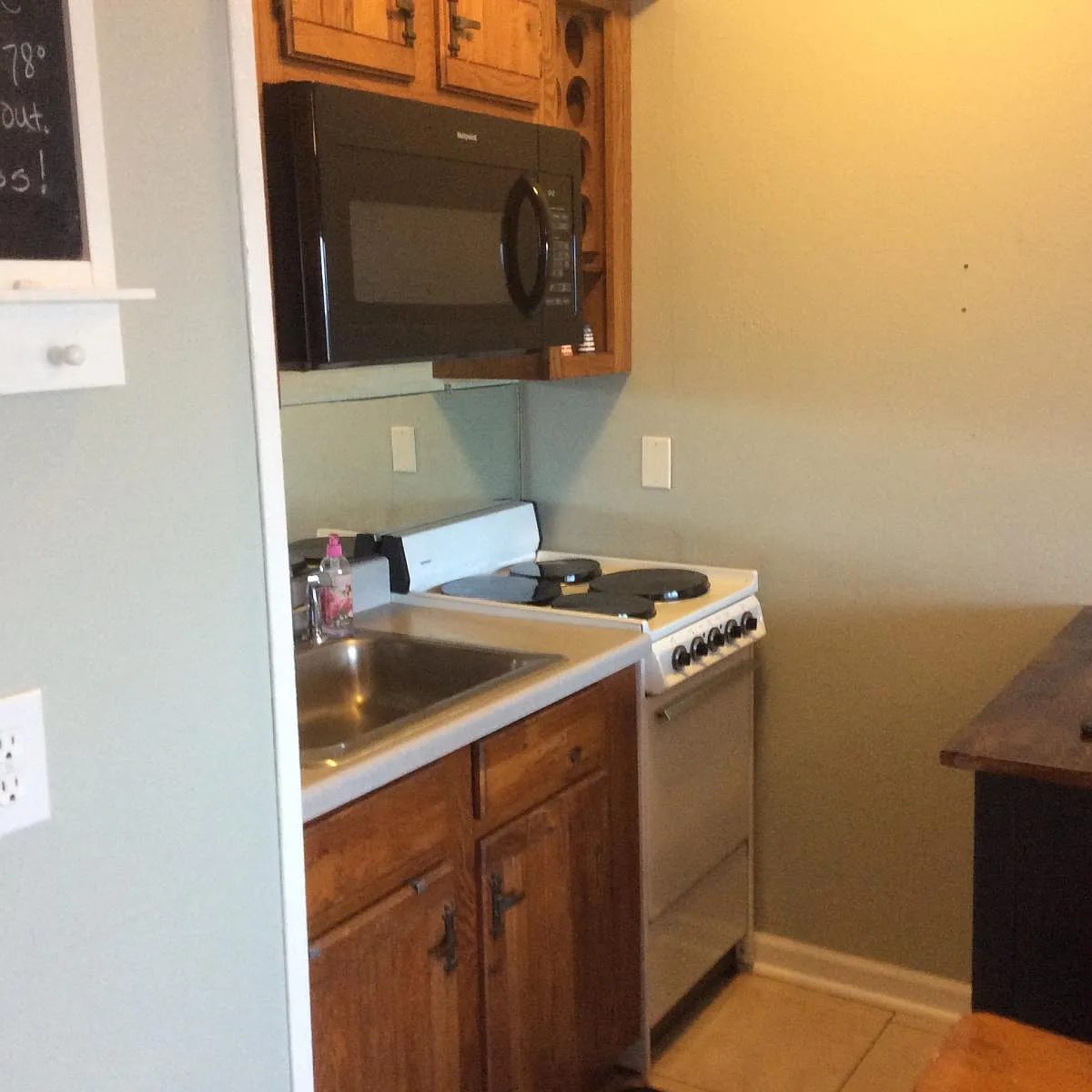 Kitchenette with apartment size appliances - 3938 Surfside Blvd #3335