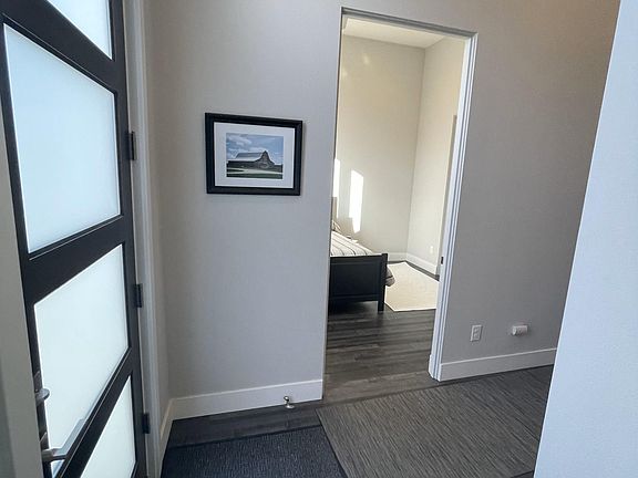 Inside front door, lower level, entry from garage view