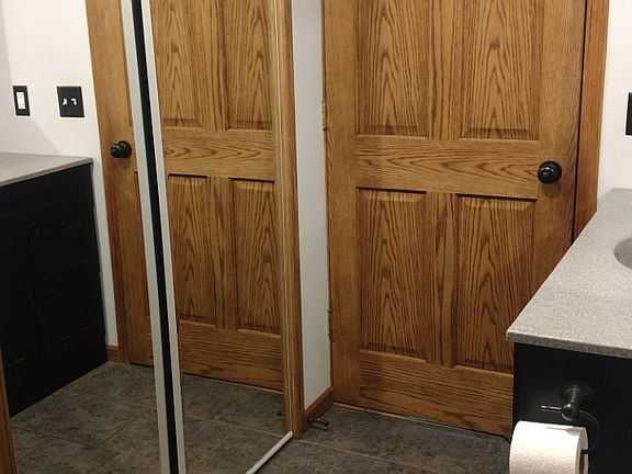 Mirrored bathroom closet