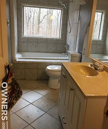 Upstairs Bathroom showing whirlpool tub.
