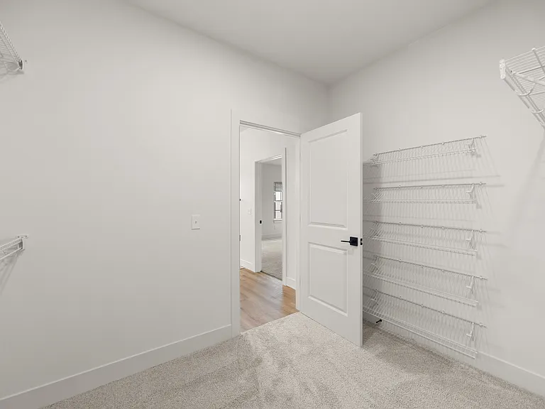 Primary bedroom's oversized walk-in closet (2-bedroom floorplan)