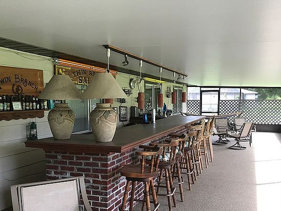 Bar with cooler and tap