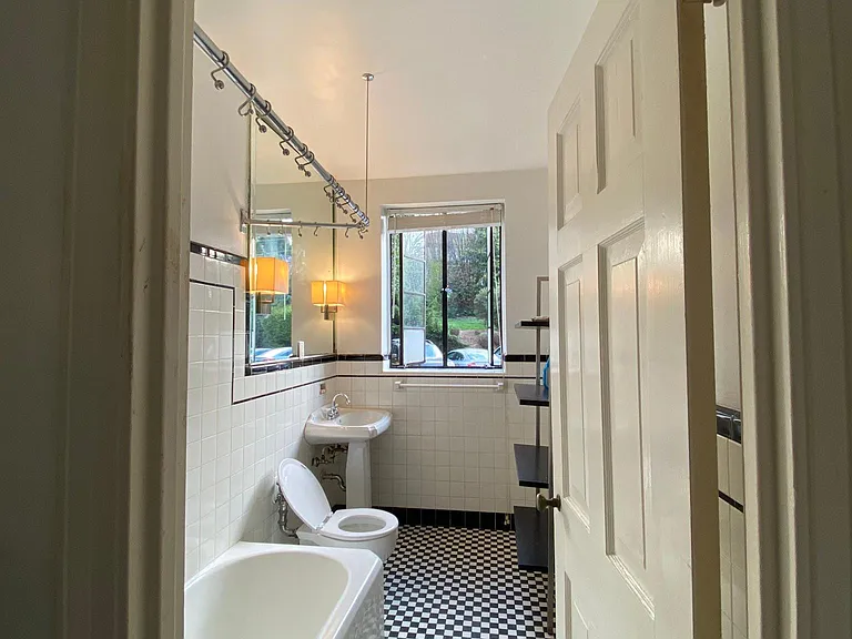 bathroom is VERY spacious and sunlit (blinds for added privacy)