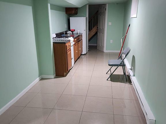 5th image of 9208 78th St Floor Basement
