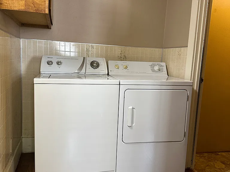 Your own washer and dryer, with cabinetry. Now that's convenience!