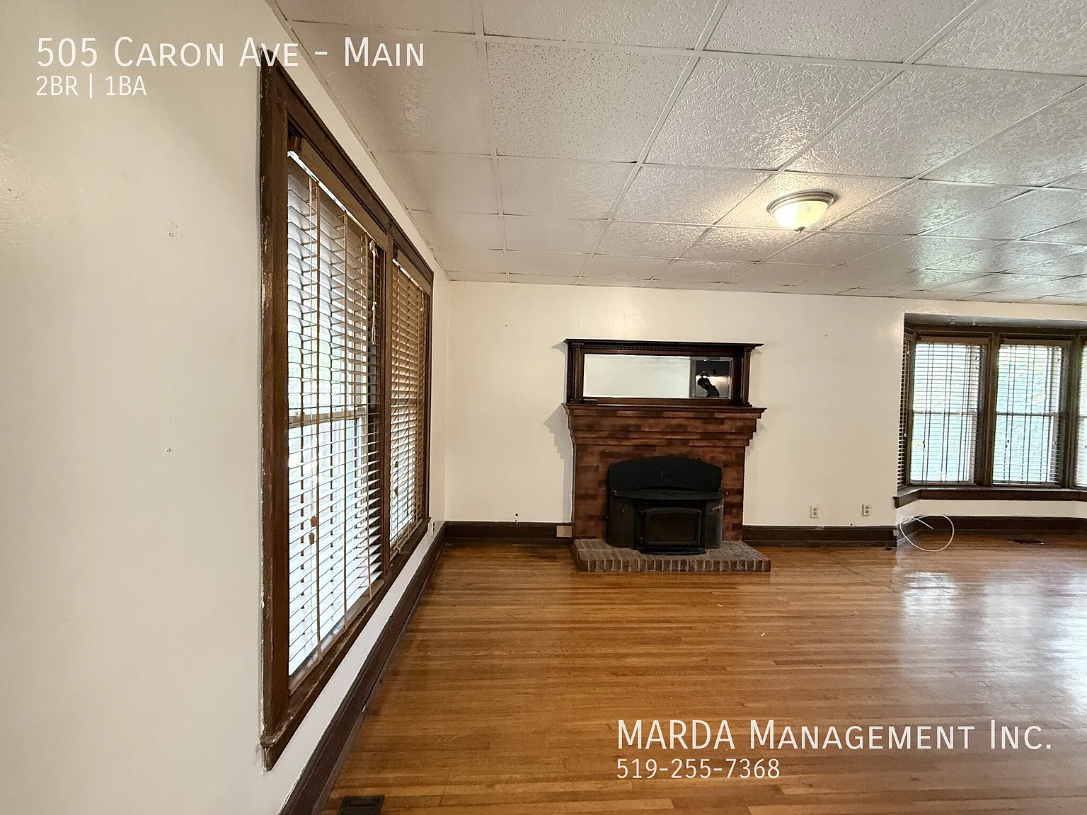 Charming 2 Bed/1 Bath Main Floor Unit W/ Driveway + 60% Of Utilities! — Photo 2